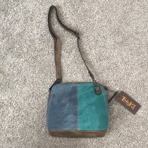 Brand new Trèskå side purse